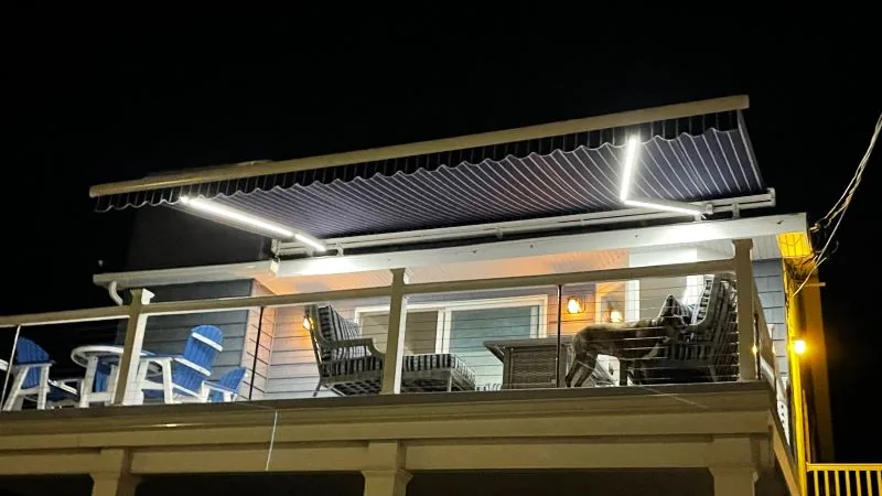 Motorized awning with integrated LED lighting creating a year-round outdoor room — All Seasons Awnings, South Jersey