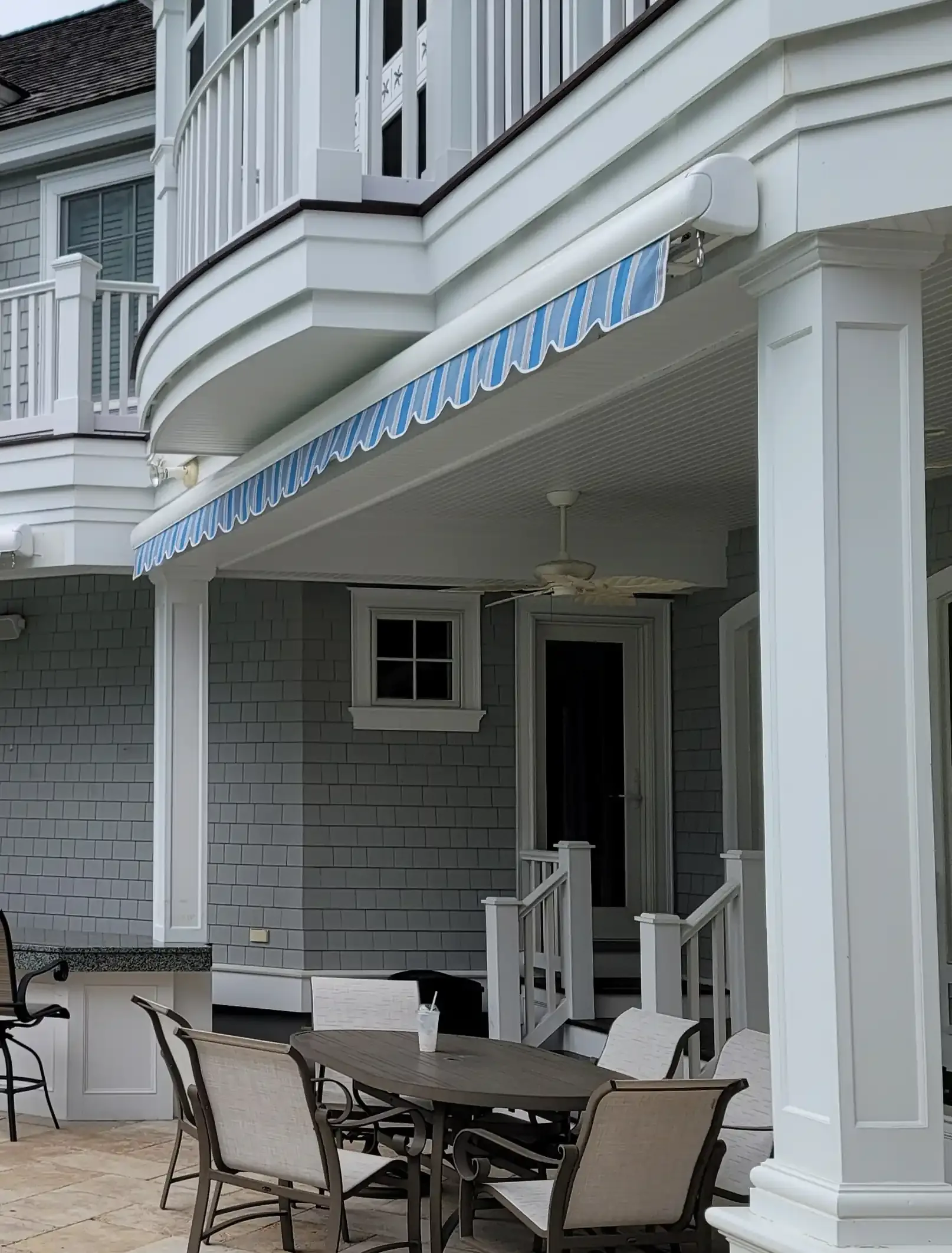 Drop-arm vertical awning over a South Jersey window — All Seasons Awnings
