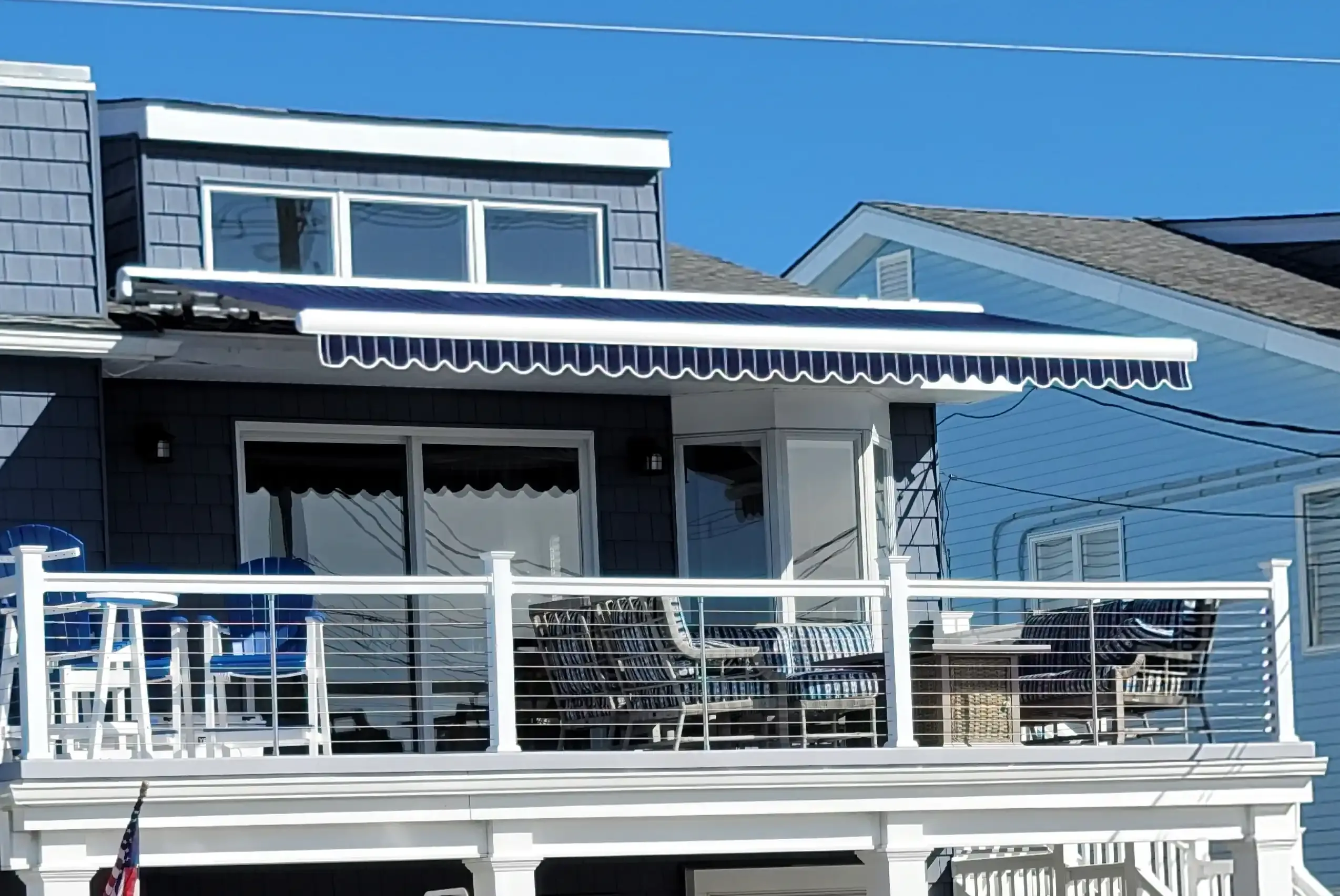 Roof-mounted motorized retractable awning with wind sensor — All Seasons Awnings, South Jersey