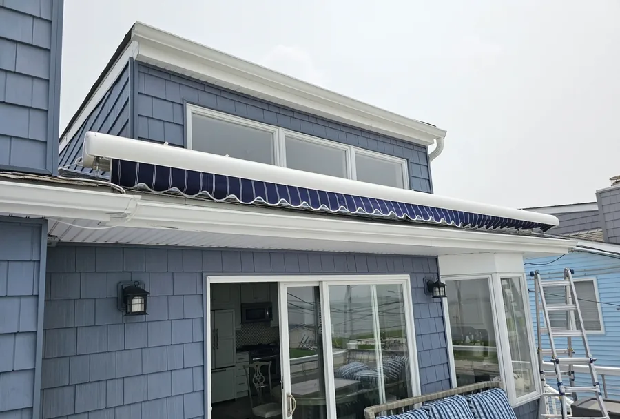 Roof-mounted motorized retractable awning — All Seasons Awnings, South Jersey